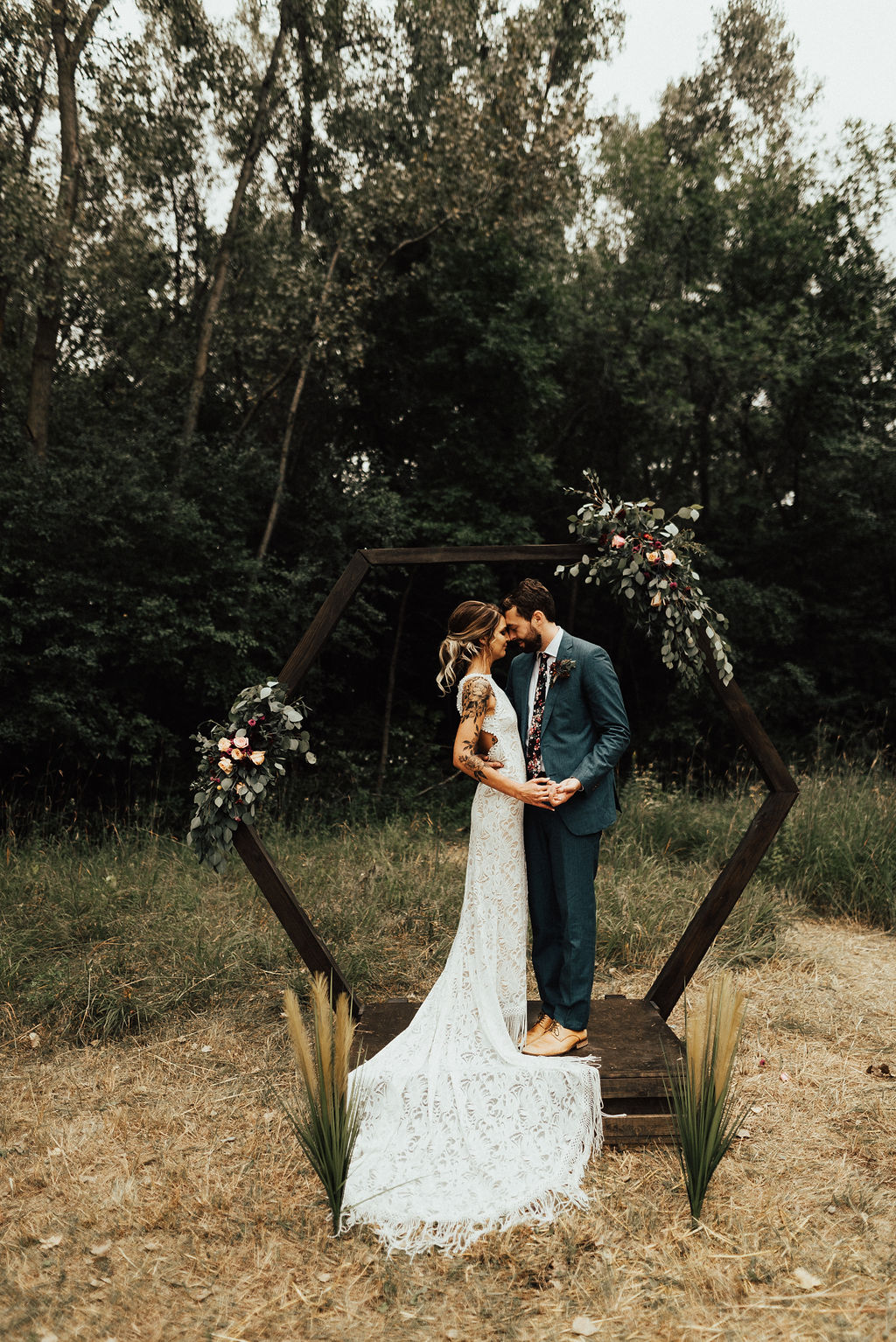 Backyard wedding ceremony arch